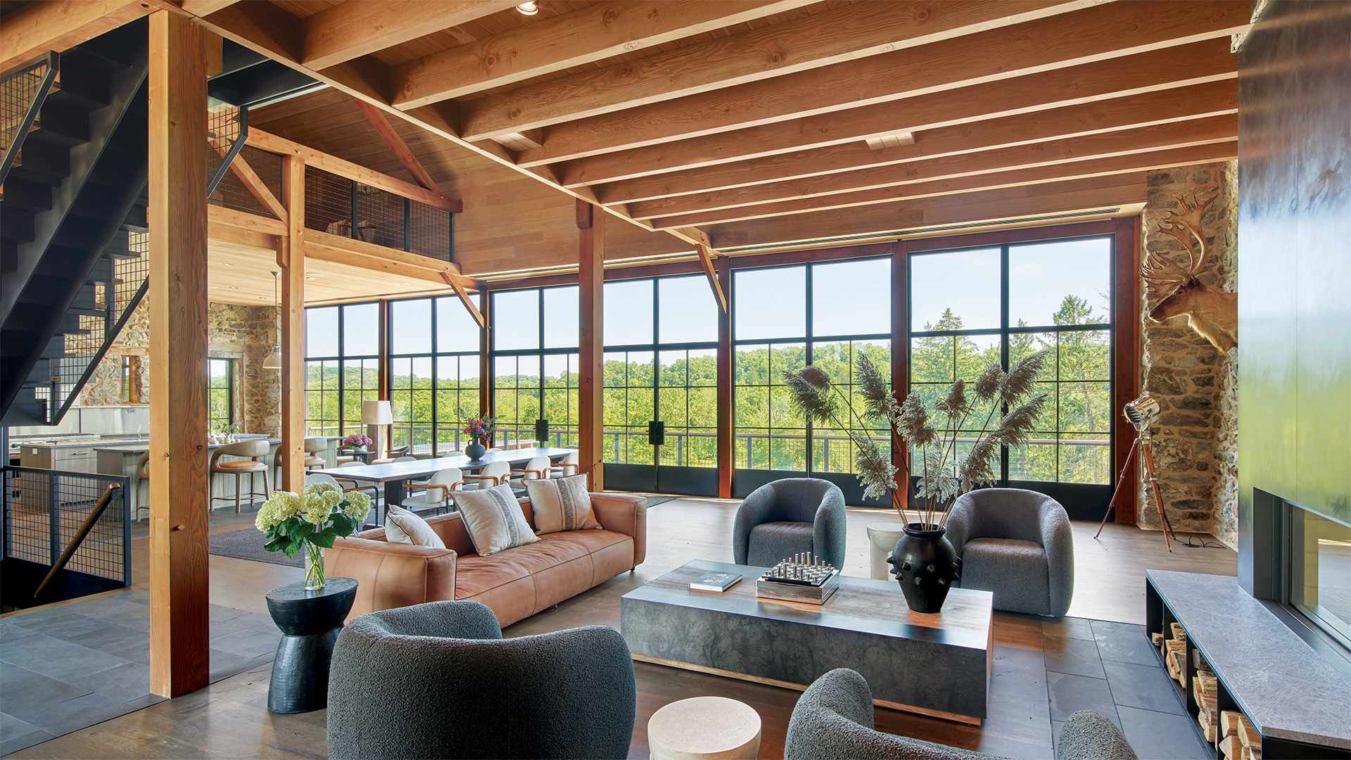 Hope's windows featured on a high-end home surrounded by an outdoor pool and plants.