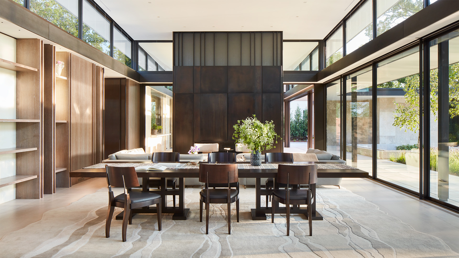 Hope's windows featured on a high-end home surrounded by an outdoor pool and plants.