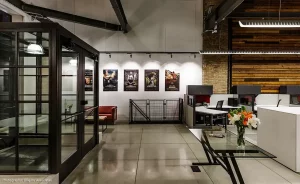 Hopes steel doors with custom mullion, muntin and glazing solutions create a welcoming vestibule that juxtaposes modern and old in this adaptive reuse building project.