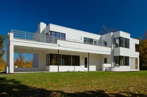 Modernist residence, The Rauh House, features Hopes University Series solid hot-rolled steel windows, exterior front view.
