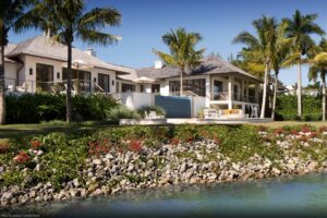 Hopes residential hurricane-resistant solid bronze windows and bifold doors shown on a high end waterfront residence.