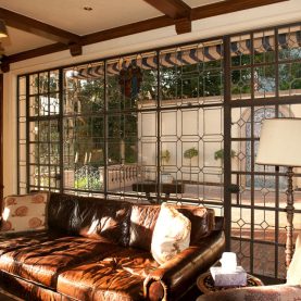 Original historic steel windows and doors, interior living room view looking through a wall of Hopes glass windows & doors.