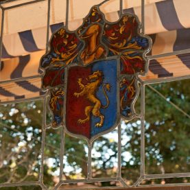 Vintage steel window with stained glass detailing completed by Hopes Windows.