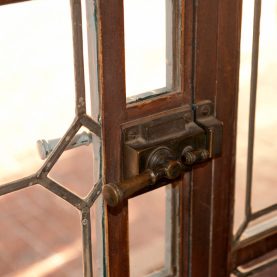 Original vintage 100 year old steel door handle and lock hardware.