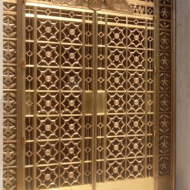 Restored historic bronze door lattice
