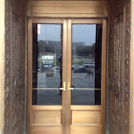 Indiana War Memorial building, custom bronze replacement doors with new hardware.