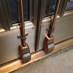 Indiana War Memorial building, custom bronze replacement doors with new hardware.