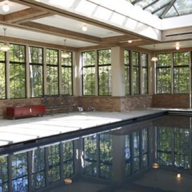 Pool house with Hope’s steel windows, doors, and skylight