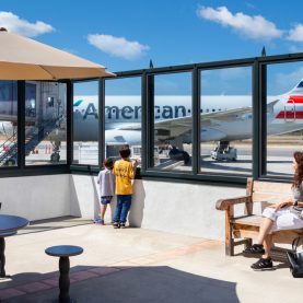 Passengers on observation deck looking through Hopes steel framed wind screen windows, located in Santa Barbara, CA.