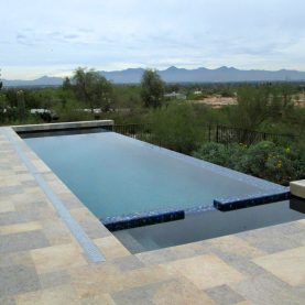 Hopes steel windows with narrow frames provide wide open poolside view in Scottsdale, AZ.