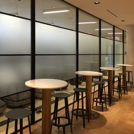 Modern interior glass walls made of Hopes steel windows and doors in an upscale Health Club.