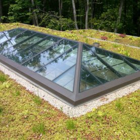 Hopes custom steel skylight lantern on a green roof displayed in a private residence pool house located in Highland Park, IL.