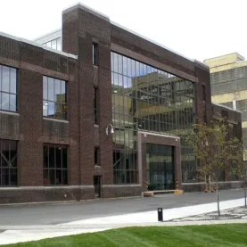 Urban Outfitters brick building entrance, highlighted by new Hopes Windows and Doors.