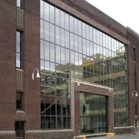 Urban Outfitters brick building entrance, highlighted by new Hopes Windows and Doors.