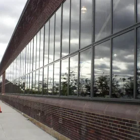 Urban Outfitters brick building close up, highlighted by new Hopes Windows and Doors.