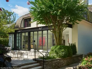 High end living space includes Hopes steel bifold folding doors, opens and closes to the outside patio space, Washington D.C.